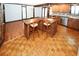 Open kitchen with a large island and hardwood floors at 8441 Lake Dr, Snellville, GA 30039