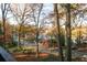 Lake view from deck with autumn leaves and road at 8441 Lake Dr, Snellville, GA 30039