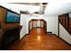 Hardwood floors, fireplace and access to other rooms at 8441 Lake Dr, Snellville, GA 30039