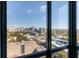 Expansive city views through large windows, showcasing the skyline and surrounding neighborhood at 2870 Pharr Court South Nw # 2602, Atlanta, GA 30305
