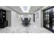 Conference room with marble floors, long table, and modern decor at 2870 Pharr Court South Nw # 2602, Atlanta, GA 30305