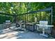 Outdoor grilling area with stainless steel grills and stone accents at 2870 Pharr Court South Nw # 2602, Atlanta, GA 30305