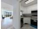 Bright kitchen open to living room features sleek appliances and an open design at 2870 Pharr Court South Nw # 2602, Atlanta, GA 30305