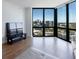 Bright living room with floor-to-ceiling windows and stunning city views at 2870 Pharr Court South Nw # 2602, Atlanta, GA 30305
