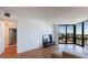 This bright living room has a floor to ceiling window and an ensuite bathroom with a standing shower at 2870 Pharr Court South Nw # 2602, Atlanta, GA 30305