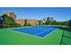 Bright, outdoor community tennis court with green and blue surfaces at 2870 Pharr Court South Nw # 2602, Atlanta, GA 30305