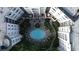 Aerial view of the complex, showcasing the central courtyard pool at 11 Perimeter E Ctr # 1203, Dunwoody, GA 30346