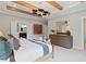 Bright bedroom with wooden beam ceilings and decorative lighting at 2810 Herrington Dr, Cumming, GA 30041