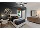Stylish bedroom featuring a basketball-themed decor, designer lighting, and modern furnishings at 2810 Herrington Dr, Cumming, GA 30041