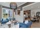 Inviting living room seamlessly connects to the dining area and showcases modern design at 2810 Herrington Dr, Cumming, GA 30041