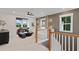 Spacious loft area with comfortable seating, natural light, and stylish decor at 2810 Herrington Dr, Cumming, GA 30041