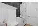 Well-appointed mud room featuring a bench, storage cabinets, and a convenient sink at 2810 Herrington Dr, Cumming, GA 30041