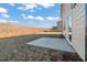 A nice-sized backyard featuring a concrete patio, perfect for outdoor seating at 4183 Viola Pl, Atlanta, GA 30349