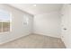 Bedroom featuring neutral carpet, lots of light, and neutral paint at 4183 Viola Pl, Atlanta, GA 30349