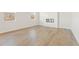 Bright and airy living space with hardwood floors, fireplace, and large windows at 4183 Viola Pl, Atlanta, GA 30349