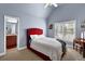 Bedroom features a Queen bed, desk, and bathroom access at 3423 Mulberry Lane Ct, Dacula, GA 30019