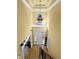 Bright foyer with high ceilings, hardwood floors, and an elegant chandelier for a grand entrance at 3423 Mulberry Lane Ct, Dacula, GA 30019