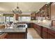Spacious kitchen features a large island, granite countertops and ample cabinet space at 3423 Mulberry Lane Ct, Dacula, GA 30019