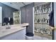 A cozy bathroom with a shower, vanity, and unique penguin shower curtain at 240 Renaissance Pkwy # 116, Atlanta, GA 30308