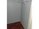 Empty closet with wood floors and a hanging rod at 2805 Northeast Ne Expy # B36, Atlanta, GA 30345