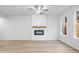 Living room with fireplace, hardwood floors and ceiling fan at 1068 Rose Dr, Marietta, GA 30060