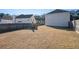 Spacious backyard area with well-maintained grass and privacy fence at 6476 Snowden Dr, Atlanta, GA 30349