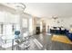 Bright living room with fireplace, sleek furniture, and abundant natural light at 6476 Snowden Dr, Atlanta, GA 30349