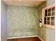 Empty room with textured walls and hardwood floors at 2328 Columbia Dr, Decatur, GA 30032