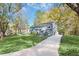 Charming single-story home with a long driveway and a well-maintained lawn and an inviting front entrance at 2190 Lang Sw Dr, Atlanta, GA 30315