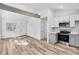 Bright open-plan living room flows into the kitchen at 2190 Lang Sw Dr, Atlanta, GA 30315