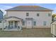 Well-maintained backyard with patio, seating area, and storage shed at 189 Osier Dr, Mcdonough, GA 30252