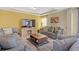 Comfortable living room with plush seating, large TV, and decorative accents at 189 Osier Dr, Mcdonough, GA 30252