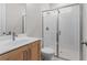 Modern bathroom featuring a glass-enclosed shower and contemporary vanity at 4790 Briscoe Dr, Cumming, GA 30028