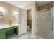 Bathroom featuring double vanity, marble floors, and glass enclosed shower at 208 Kenninghall Ln # 627, Smyrna, GA 30082