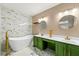 Modern bathroom featuring a soaking tub, double vanity with gold fixtures, and stylish tile at 208 Kenninghall Ln # 627, Smyrna, GA 30082