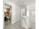 Upstairs hallway featuring a bathroom and a large closet in a home with neutral paint at 208 Kenninghall Ln # 627, Smyrna, GA 30082