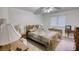 Cozy bedroom with traditional decor, with vintage furniture, and a ceiling fan at 110 Cove Ln, Social Circle, GA 30025
