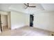 Bedroom with hardwood floors, a ceiling fan, and neutral walls at 110 Cove Ln, Social Circle, GA 30025