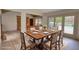 Dining room offering great views of the backyard pool and a seamless transition to the living room at 110 Cove Ln, Social Circle, GA 30025