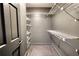 A well-organized walk-in closet with custom shelving and ample storage space at 110 Cove Ln, Social Circle, GA 30025