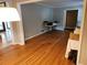 Open living room with hardwood floors and a view to the outside at 2479 Landeau Cir, Tucker, GA 30084