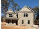 Two-story brick home with gray shutters under construction at 4505 Ajo Walk, Atlanta, GA 30331