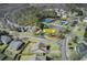 Community aerial view showcasing neighborhood amenities including tennis courts and pool at 120 Mill Creek Dr, Canton, GA 30115