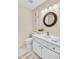 Bright bathroom with white cabinets, modern fixtures, and framed artwork at 120 Mill Creek Dr, Canton, GA 30115