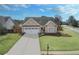 Attractive single-Gathering home with a two-car garage, well-kept lawn, and inviting curb appeal in a desirable neighborhood at 120 Mill Creek Dr, Canton, GA 30115