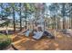 Well-equipped playground with slides and climbing frames, surrounded by lush trees for a natural setting at 120 Mill Creek Dr, Canton, GA 30115