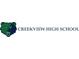 Creekview High School logo with a green bear head on a white background at 120 Mill Creek Dr, Canton, GA 30115