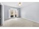 Bright bedroom with large windows and neutral wall colors at 500 Meadowmeade Ln, Lawrenceville, GA 30043