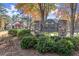 Stone community sign, 'The Club at Edgewater,' surrounded by lush landscaping at 500 Meadowmeade Ln, Lawrenceville, GA 30043