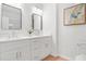 Modern bathroom with double vanity and white cabinets at 2048 Chicago Nw Ave, Atlanta, GA 30314